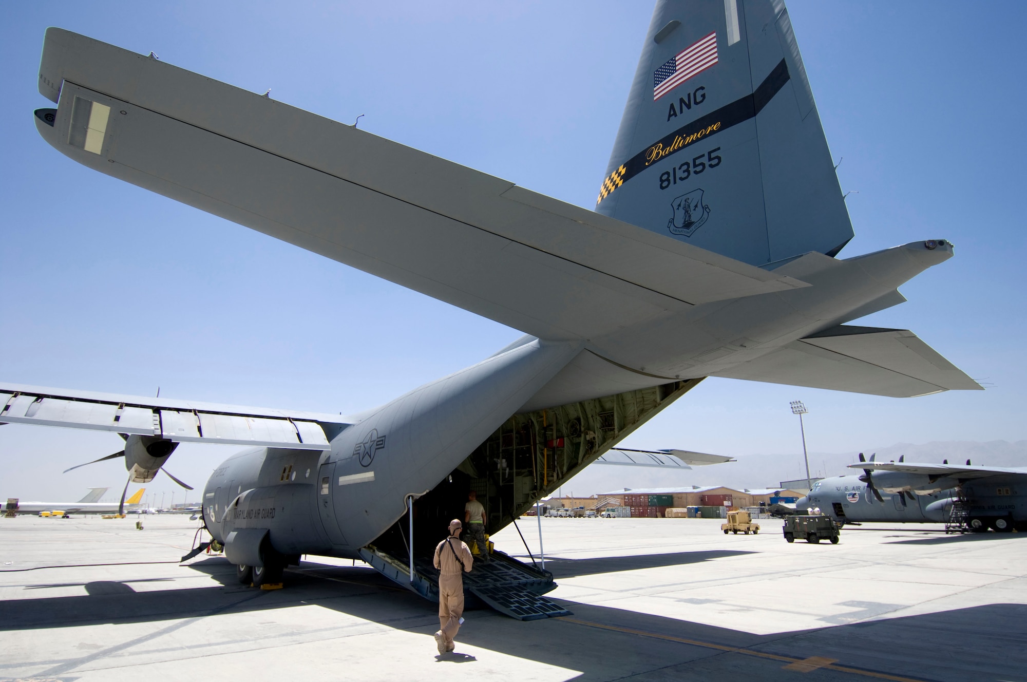 BAGRAM AIRFIELD, Afghanistan -- An Air National Guard C-130 aircraft from Baltimore, Md., sits on the tarmac here on July 8, 2008. Members of the 455th Expeditionary Aeromedical Evacuation Flight worked to quickly convert the aircraft for an aeromedical evacuation. (U.S. Air Force photo by Staff Sgt. Samuel Morse)