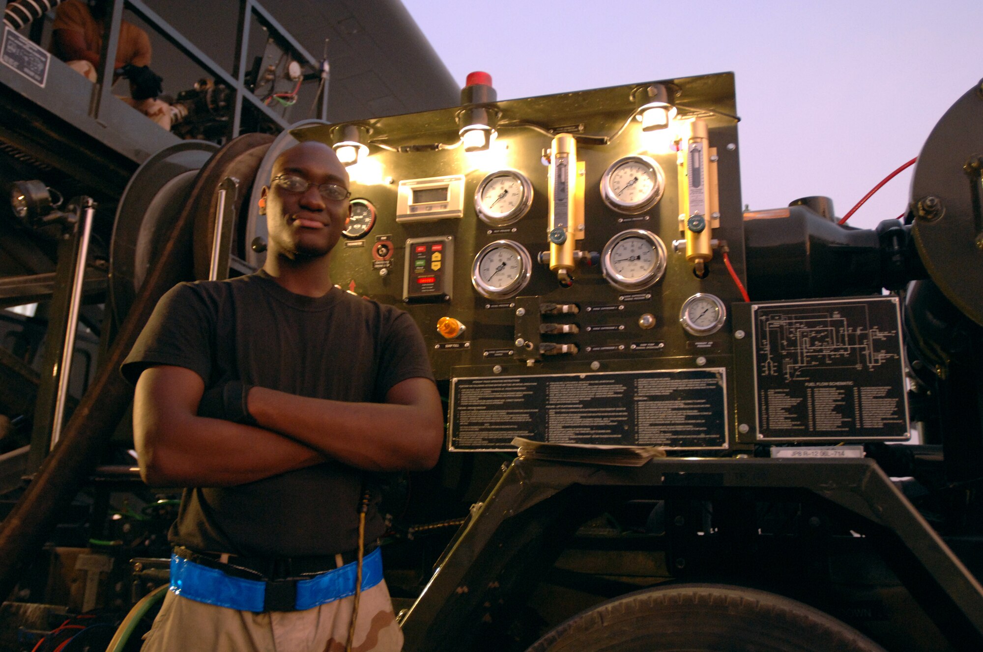 Senior Airman Jose Malonda, 380th Expeditionary Logistics Readiness Squadron Fuels Distribution Operator. Airman Malonda recently set the Air Force record for most fuel pumped in one month with a total of 4,375,960 gallons issued during the month of June. (U.S. Air Force photo by Senior Airman Ross M. Tweten.)