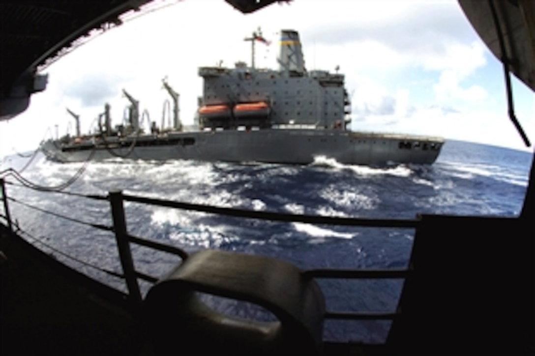 The fleet replenishment oiler USNS Guadalupe conducts a refueling at sea with the aircraft carrier USS Kitty Hawk, Pacific Ocean, July 9, 2008. The USS Kitty Hawk will be participating in Rim of the Pacific 2008 exercise that includes units from the United States, Australia, Chile, Japan, the Netherlands, Peru, South Korea, Singapore and the United Kingdom. 