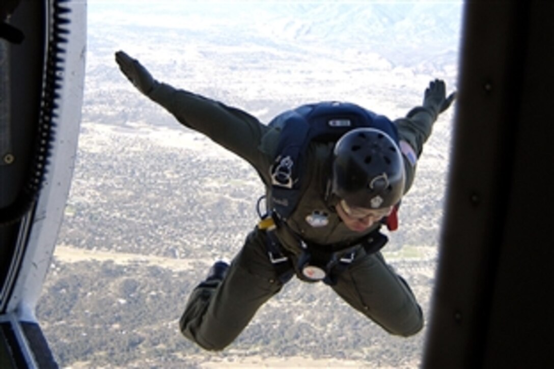 A U.S. Air Force Academy cadet departs a Twin-Otter jump plane at 4,500 feet during Airmanship 490, Basic Parachuting, a program in which cadets earn their basic jump wings after successfully completing five free-fall jumps at the academy in Colorado, June 27, 2008. 