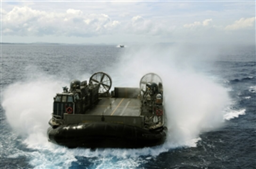 A landing craft air cushioned, also known as an LCAC, assigned to Assault Craft Unit 5, enters the well deck of the dock landing ship USS Harpers Ferry (LSD 49) on June 23, 2008.  The Harpers Ferry is part of the Essex Expeditionary Strike Group forward deployed to Sasebo, Japan.  