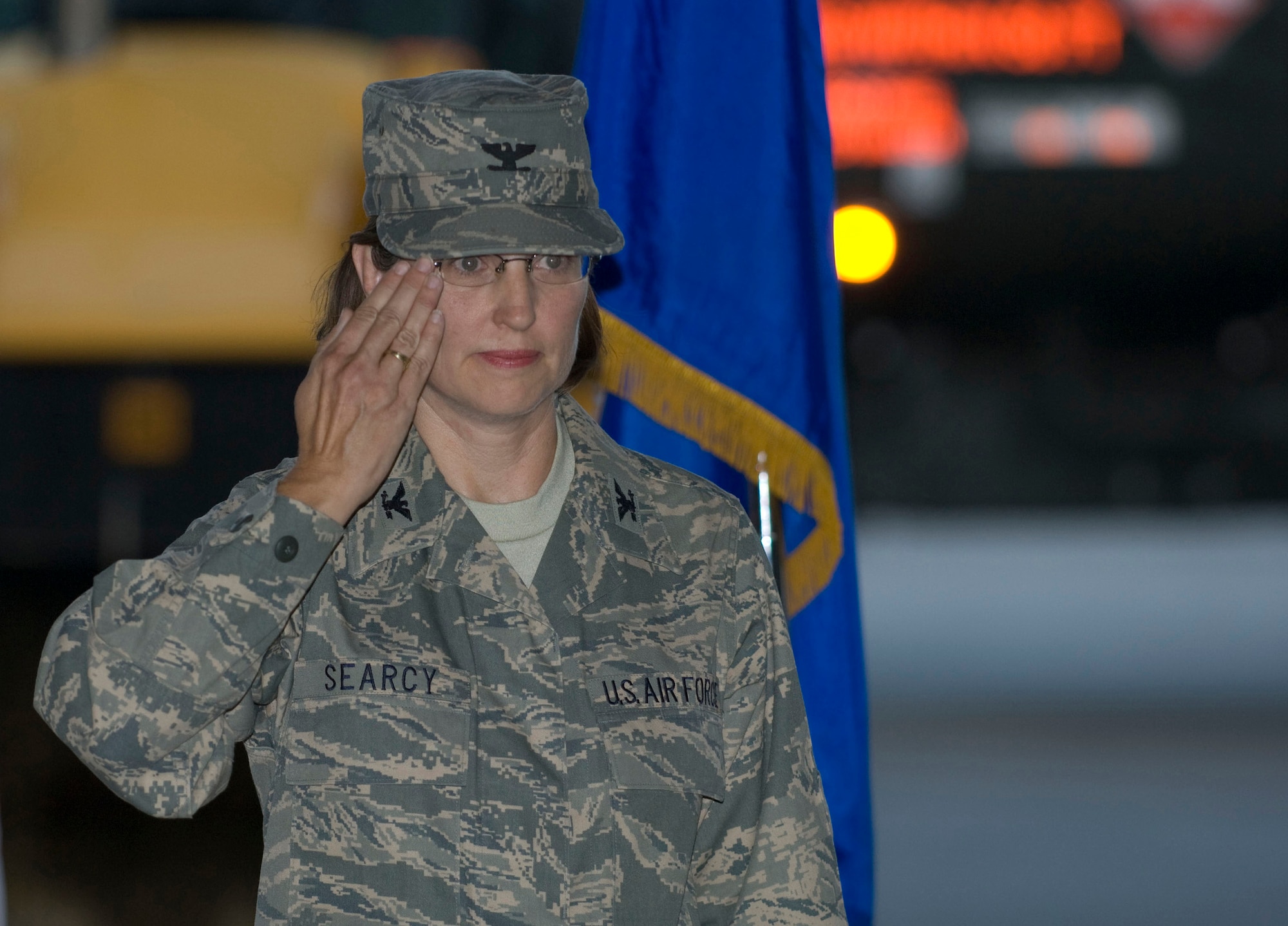 BAGRAM AIR FIELD, Afghanistan -- Col. Patricia Searcy, commander of the 455th Expeditionary Mission Support Group, returns a salute from the 455th EMSG here on July 10, 2008. This salute was the traditional "first salute" welcoming Colonel Searcy following the 455th EMSG's change of command ceremony. (U.S. Air Force photo by Staff Sgt. Samuel Morse)