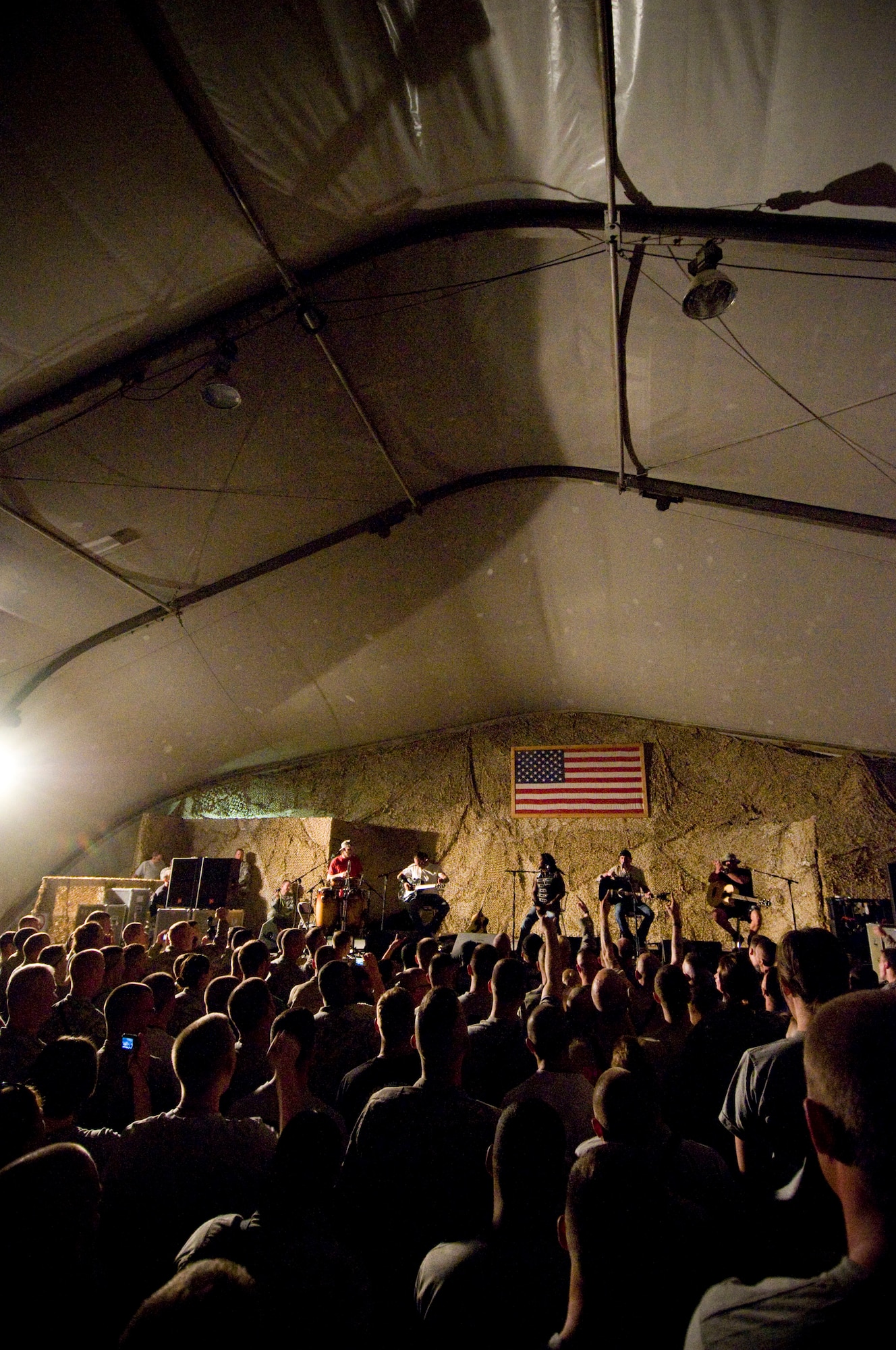 BAGRAM AIR FIELD, Afghanistan -- Rock group "Sevendust" performs here on July 12, 2008. "Sevendust," from Atlanta, Ga., gave a USO-sponsored tour throughout Southwest Asia, performing for deployed coalition forces. (U.S. Air Force photo by Staff Sgt. Samuel Morse)