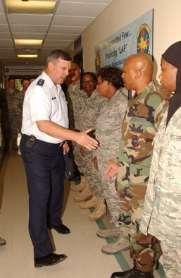 ANDREWS AIR FORCE BASE, Md. - During his visit to the 459th Air Refueling Wing July 12 Maj. Gen. Robert E. Duignan, 4th Air Force commander, congratulates members of the 459th Aerospace Medicine Squadron on their outstanding score for the Health Services Inspection held in June. (U.S. Air Force photo/Master Sgt. Shayne Sewell)