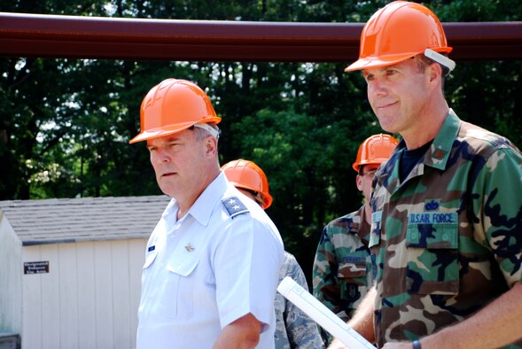 ANDREWS AIR FORCE BASE, Md. -- Maj. Gen. Robert E. Duignan, 4th Air Force commander, observes progress of a roofing project with Maj. Robert A. Haddix, 459th Civil Engineering Squardon commander. The general toured various organizations within the 459th Air Refueling Wing and attended the wing change of command ceremony July 13. Col. Stayce Harris handed the flag to Col. Tim Cahoon. Colonel Cahoon officially assumes command Aug. 1. (U.S. Air Force photo/Tech. Sgt. Eric Sharman)