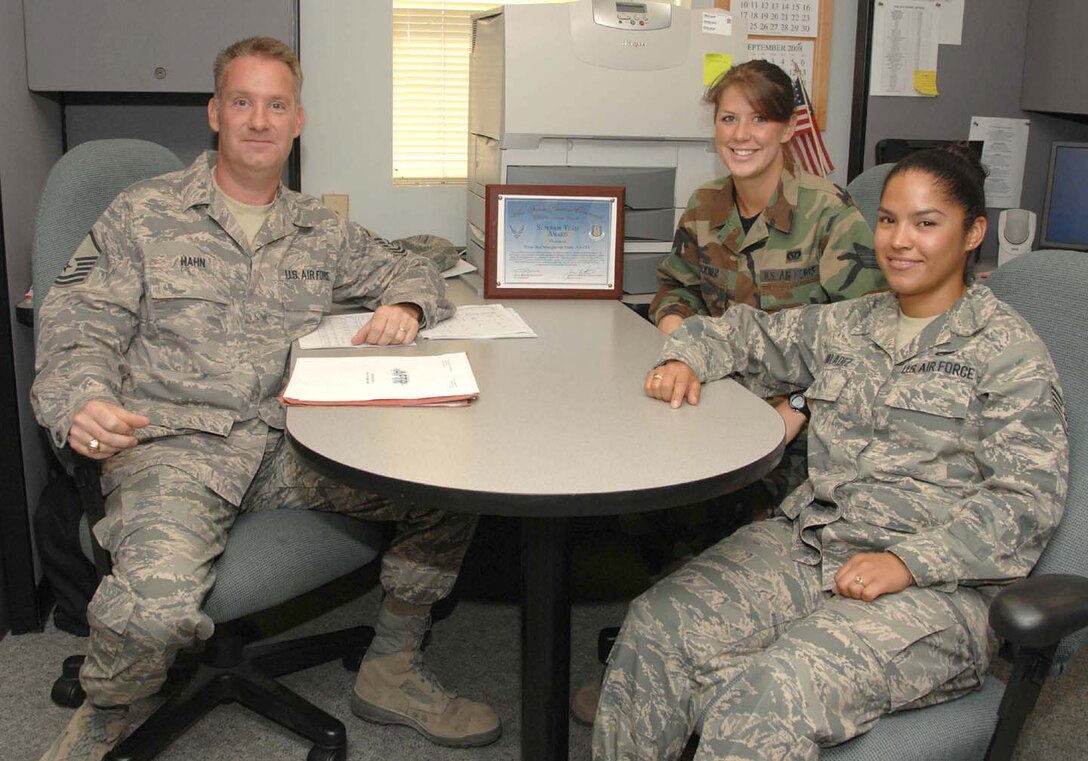 SEYMOUR JOHNSON AIR FORCE BASE, N.C. -- Four members of the 916th Civil Engineer Squadron were recognized on Sunday during the Inspector General outbrief as the only superior team during a unit compliance inspection that ended Saturday. Pictured are: Master Sgt. John Hahn (left), Senior Airman Emily Bruckner (back right) and Staff Sgt. Lucia Valadez (front right). Unavailable for the picture is Master Sgt. Steve Bentley. The four reservists work as part of the Prime BEEF Management Team, managing ancilliary training and all job skill training for the engineer squadron. U.S. Air Force photo/TSgt. Gillian Albro
