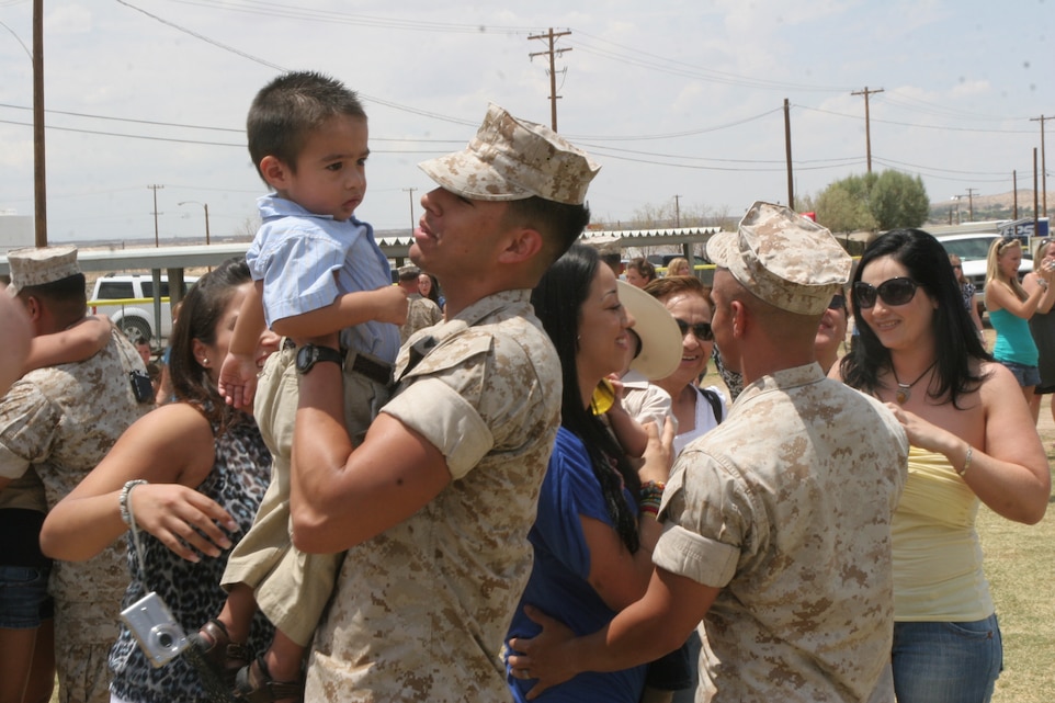Marines and sailors of Lima Battery, 3rd Battalion, 12 Marine Regiment, greet their families and supporters July 14, 2008 after a six-month deployment to the Western Pacific and Okinawa, Japan.  Lima Battery deployed with the 31st Marine Expeditionary Unit.