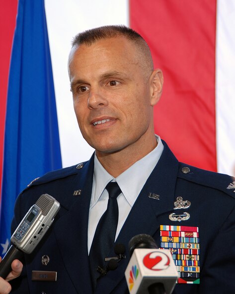 Col. Bradley D. Spacy speaks to members of the news media after taking command of the 88th Air Base Wing at Wright-Patterson Air Force Base, Ohio on July 14. The wing is comprised of more than 5,000 Airmen, civilian employees and contractor personnel who operate, maintain and defend one of the Air Force's largest and most organizationally diverse installations.  (U.S. Air Force photo/Ben Strasser).