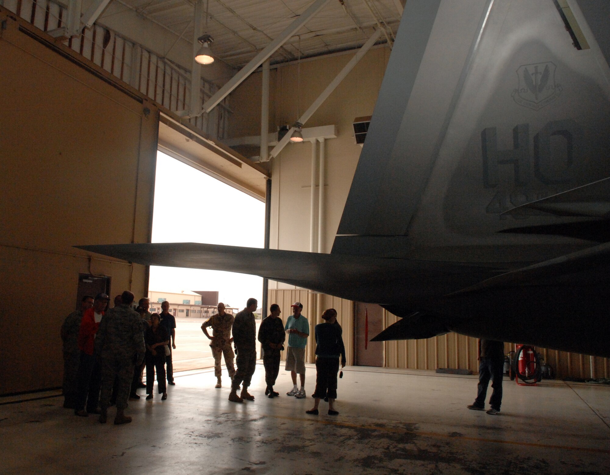 Three veterans from the Berlin Airlift visit Holloman Air Force Base, N.M., and check out it?s newest fighter jet, the F-22A Raptor July 11. The 60th Anniversary of the Berlin Airlift was commemorated the night before in a ceremony hosted by the German air force. (U.S. Air Force photo/Airman Sondra M. Wieseler)