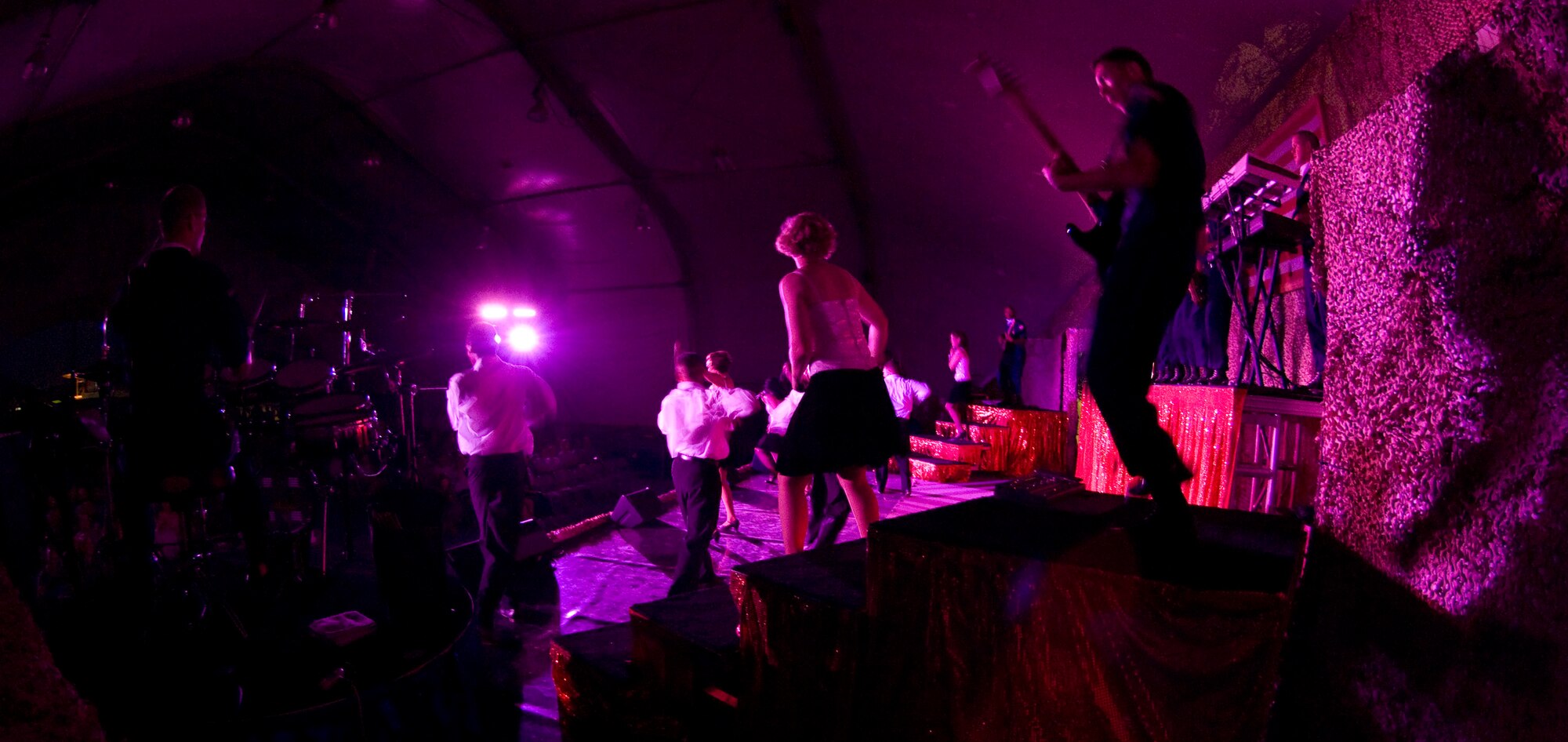 BAGRAM AIR FIELD, Afghanistan -- A view from backstage during a Tops in Blue performance here on July 13, 2008. Vocalists and instrumentalists representing a wide range of career fields across the Air Force auditioned to tour for 9 months performing the 2008 show "Deja Blue" all over the world. Bagram Air Field was their second stop in Southwest Asia. (U.S. Air Force photo by Staff Sgt. Samuel Morse)