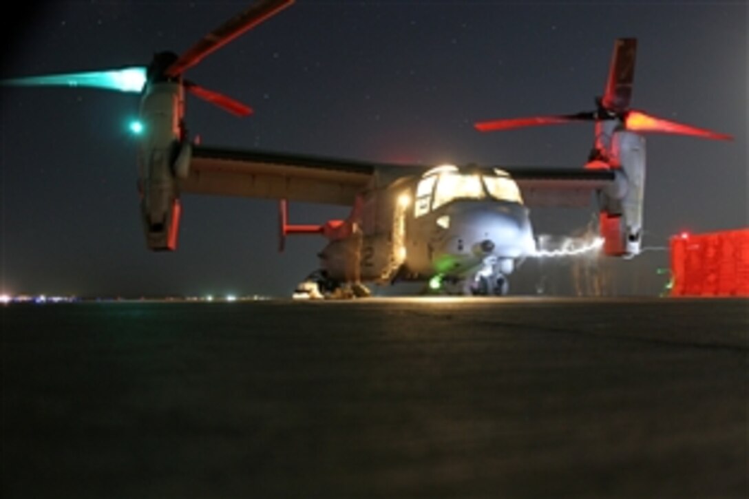 U.S. Marines shut down an MV-22 Osprey tilt-rotor aircraft after a mission in Asad, Iraq, July 10, 2008. The Marines are "Golden Eagles" of Marine Medium Tiltrotor Squadron 162, 3rd Marine Aircraft Wing Forward.