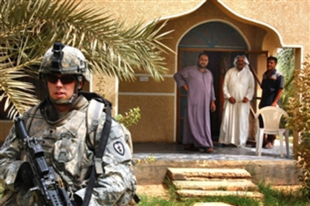 U.S. Army Spc. Jonathan Martin departs a sheik’s home after discussing essential services, security, and business grants while enjoying Iraqi cuisine in the Taji Qada, northwest of Baghdad, July 9, 2008. Martin is an infantryman assigned to Company B, 1st Battalion, 27th Infantry Regiment, 25th Infantry Division. 

