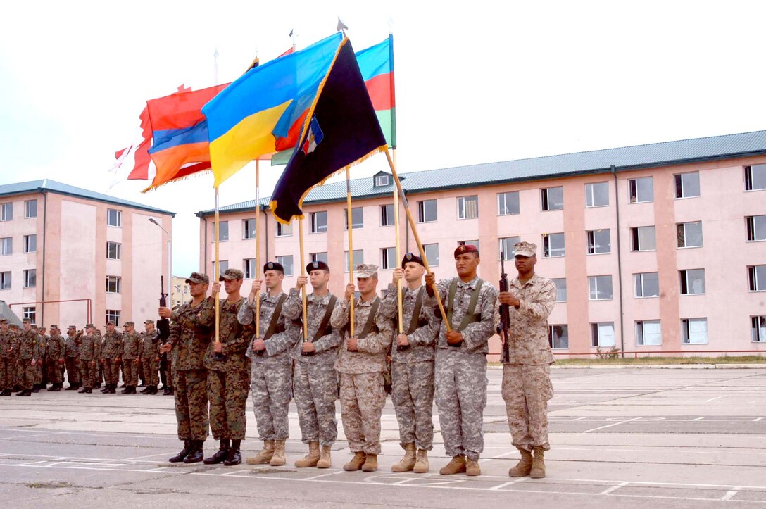 The joint-service, multi-national color guard, consisting of two Marines, four U.S. soldiers, and two Georgian soldiers, posted the colors during the opening ceremony here for Immediate Response 2008 July 14.
