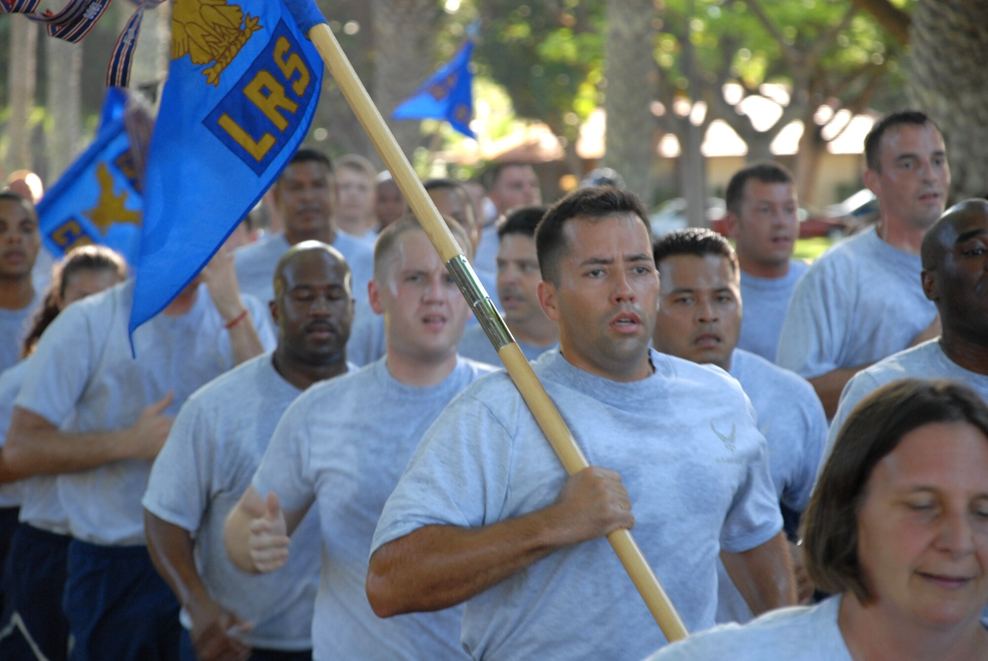Team Hickam Members press toward the finish line during the July 11 Warrior Run. This month’s run took on a different route and a later starting time. (U.S. Air Force Photo/Staff Sgt. Erin Smith)