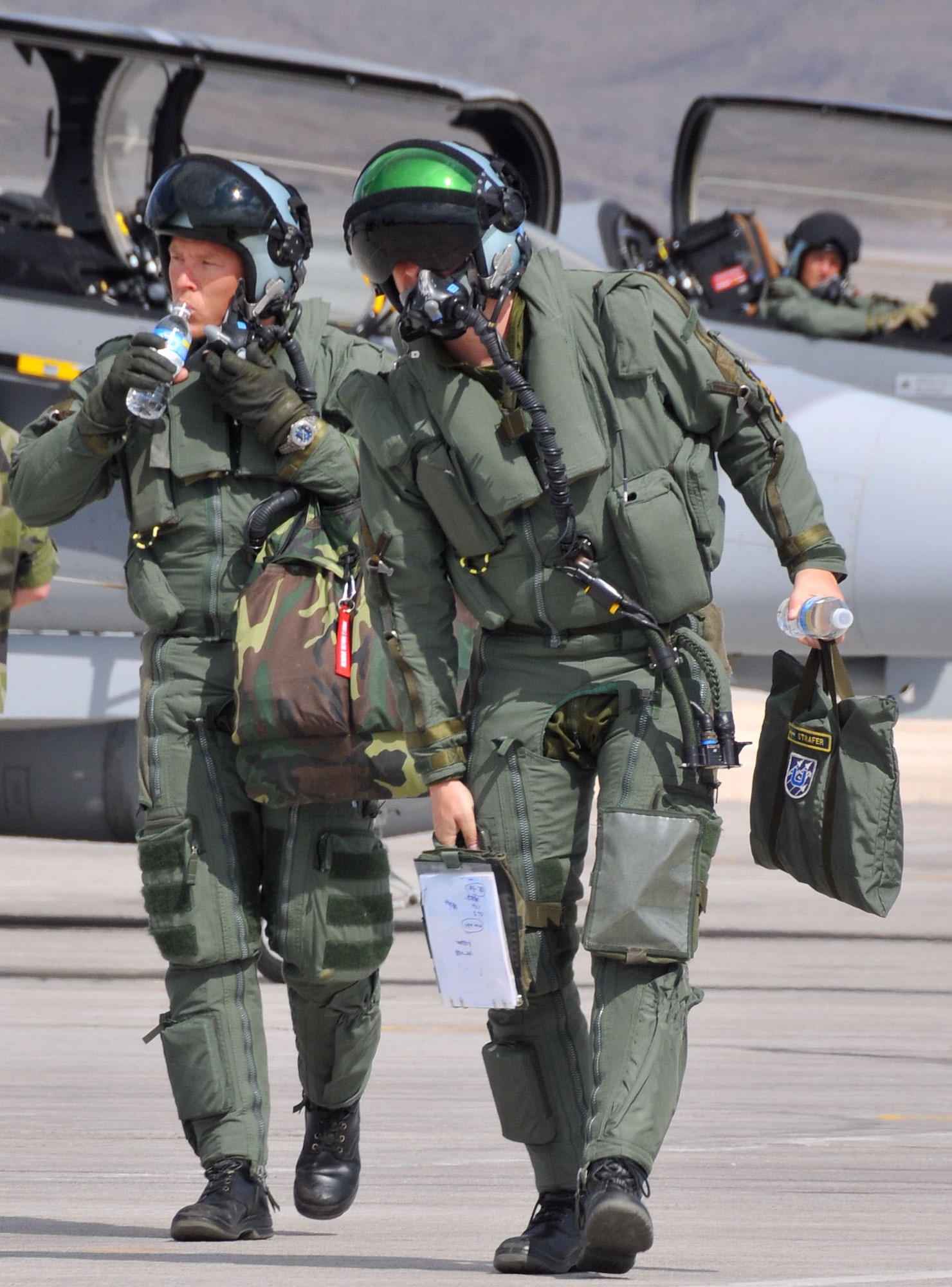 Swedish air force pilots from the 212nd Fighter Squadron at Norrbotten Wing, Sweden, arrive at Nellis AFB, Nev., for Red Flag 08-3.  Seven JAS-39 Gripen fighters and their crews are participating in their first Nellis Red Flag exercise.  They will be joined by U.S., Brazilian and Turkish forces for the exercise, which runs July 19 - Aug. 2.  (U.S. Air Force photo by Chief Master Sgt. Gary Emery)