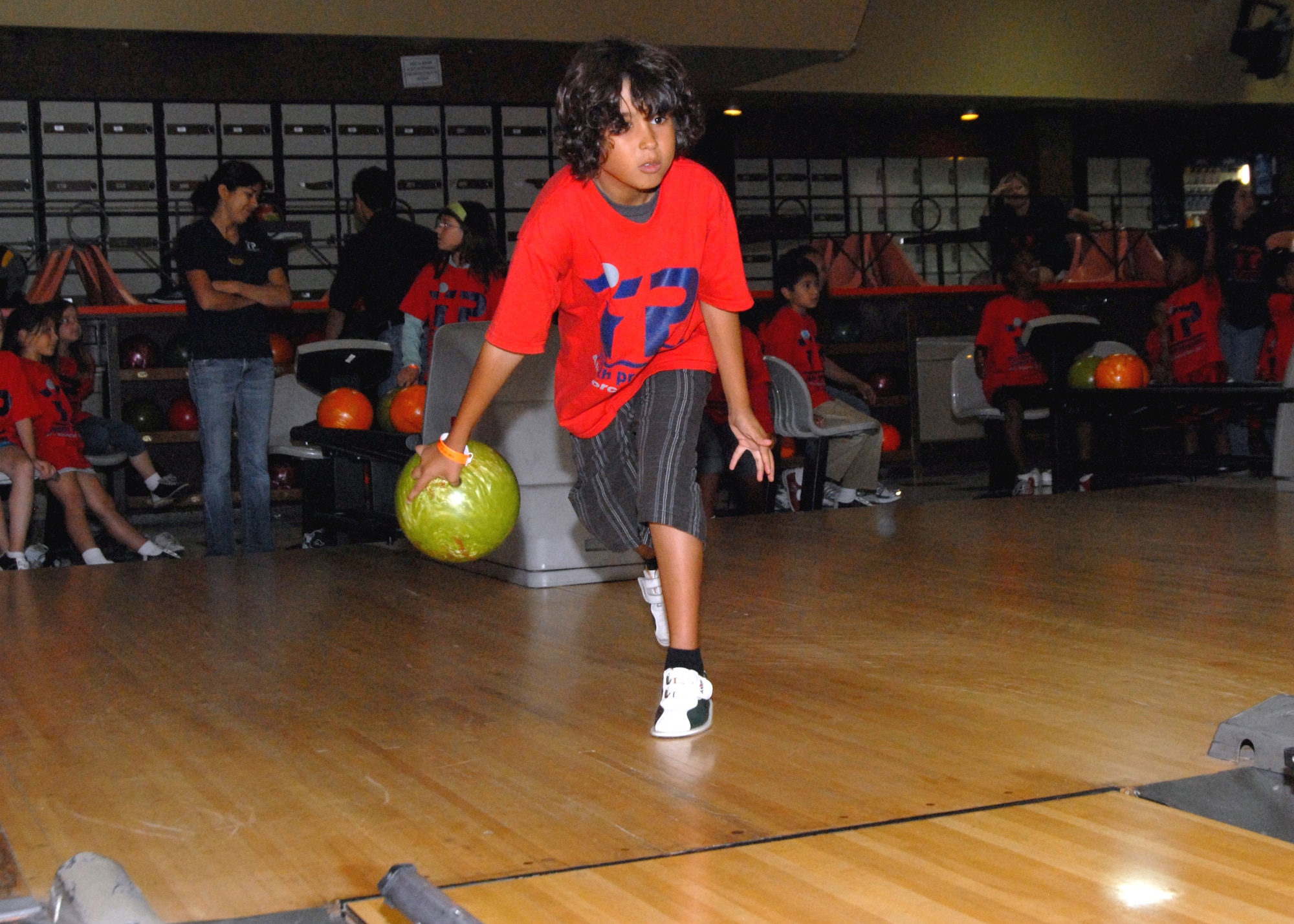 Robert McIntosh eyes the pocket as he prepares to throw the ball during the Los Angeles Air Force Base Youth Center’s 2008 Summer Camp kickoff fieldtrip to a bowling alley in Torrance.  The Summer Camp runs through August 29.  Parents can sign up their children weekly to participate in the fieldtrips which include swimming on Tuesdays and Thursday from 1-3 p.m.  For details, call the Youth Center at 310-653-8383.   (Photo by Joseph Juarez)