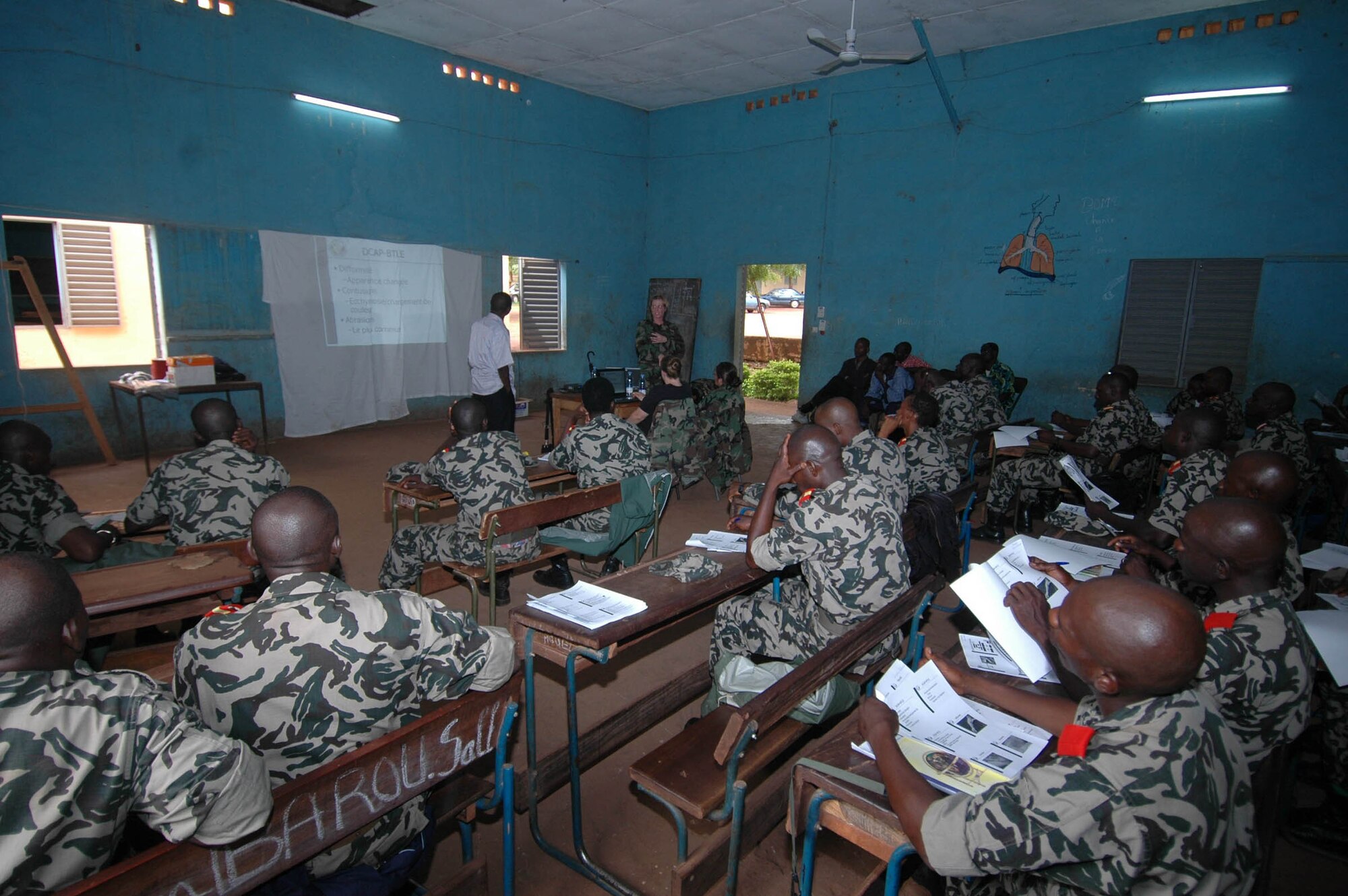 BAMAKO, Mali -- Staff Sgt. Churyl Liston teaches Malian medics and nurses how to handle a mass casualty accident, July 15, 2008 in the village of Kati. More than 90 servicemembers deployed to Mali for MEDFLAG 08, a multi-national medical training exercise designed to enhance medical capabilities and readiness for U.S. and African forces. Sergeant Liston is a medical technician assigned to the 31st Medical Group, Aviano Air Base, Italy. (U.S. Air Force photo/Senior Airman Justin Weaver)