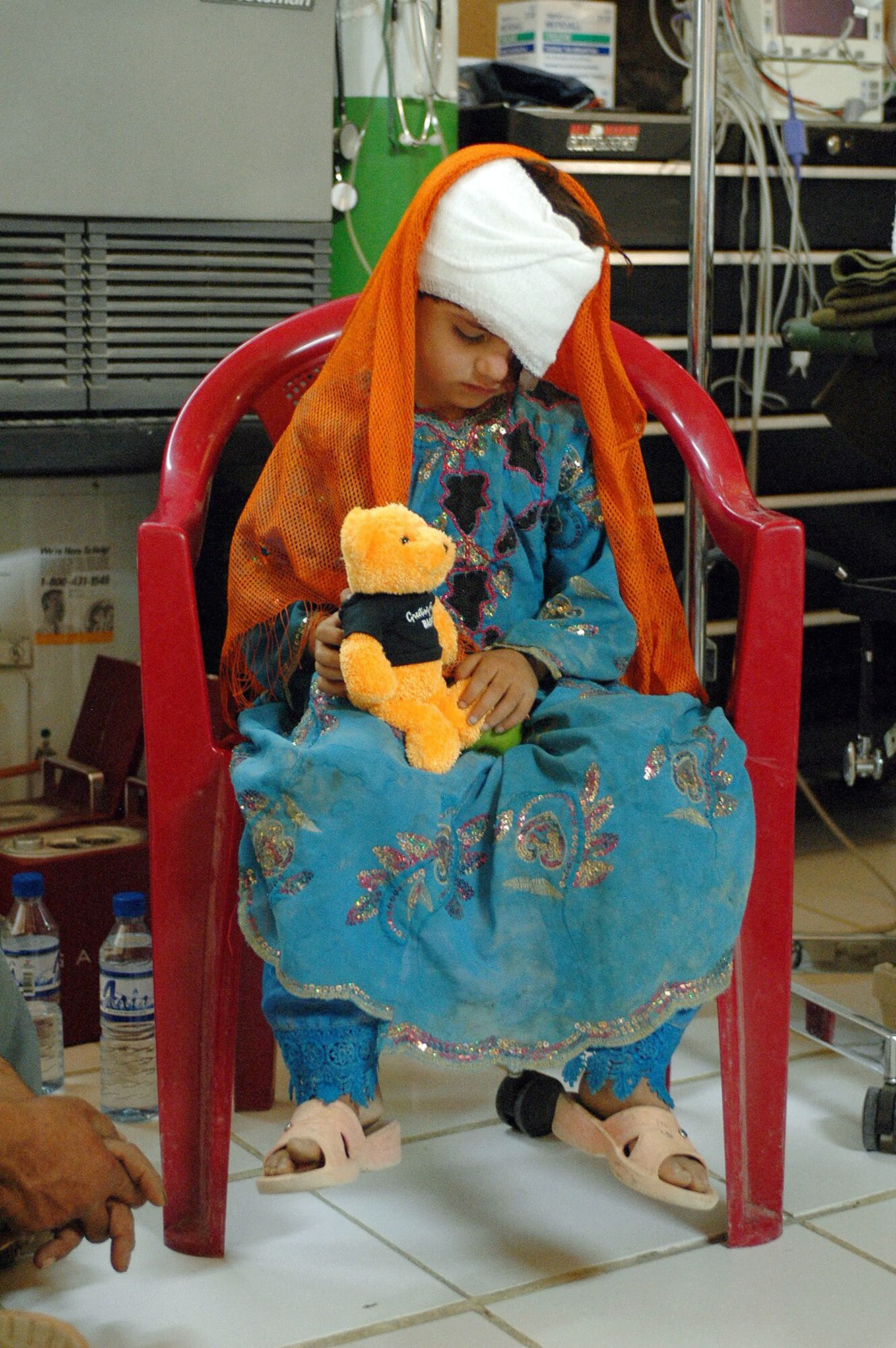 Gulzana Haqim, a 6-year-old Afghan girl, waits in a U.S. Special Forces medical facility in Afghanistan before being transported to Craig Joint Theater Hospital on Bagram Air Field for examination on June 9. The young girl was diagnosed with a tumor over her eye -- an affliction that has an extremely low chance of survival in Afghanistan. However, Coalition doctors treated her and she is on her way to recovery. (U.S. Army photo/Sgt. Daniel Love) 
