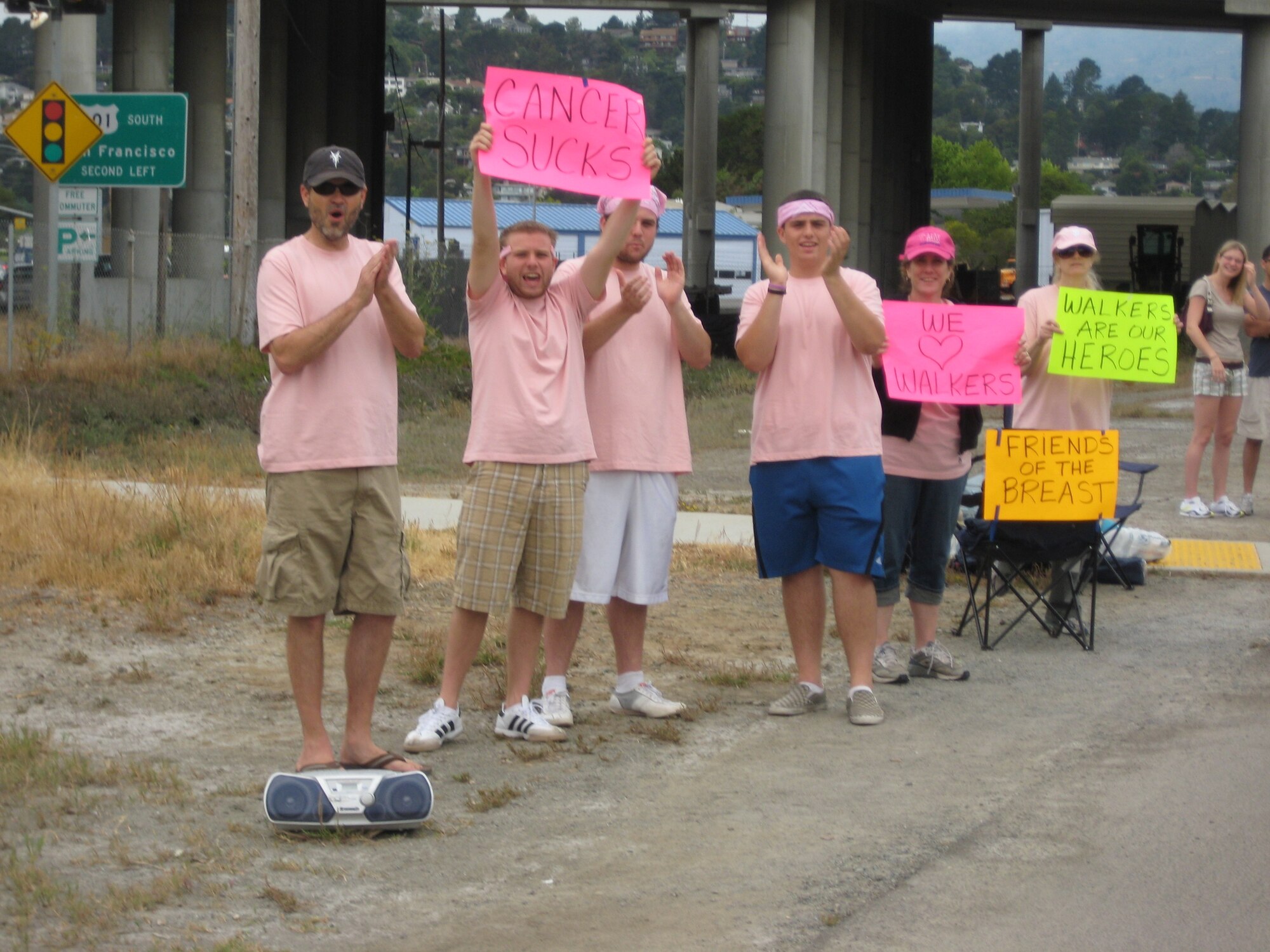 Family members and San Francisco residents cheer on the particpants walking in the San Francisco Avon Walk for Breast Cancer July 13. Walkers had the choice of walking 13.1, 26.2 or 39.3 miles over the two day event. The Avon Walk for Breast Cancer is a series of weekend fundraising events held in large U.S. cities. Photo by Senior Airman Christine Collier. 