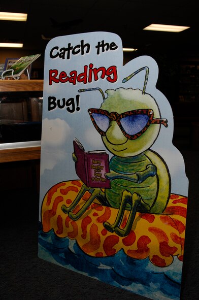 MINOT AIR FORCE BASE, N.D. -- The “Catch the Reading Bug” summer reading program began here June 7 at the base library and runs until Aug. 9. Roosevelt Park Zoo and the library teamed up July 12 for an insect demonstration giving children a chance to see some interesting bugs up close. (U.S. Air Force photo by Staff Sgt. Thomas Dow)