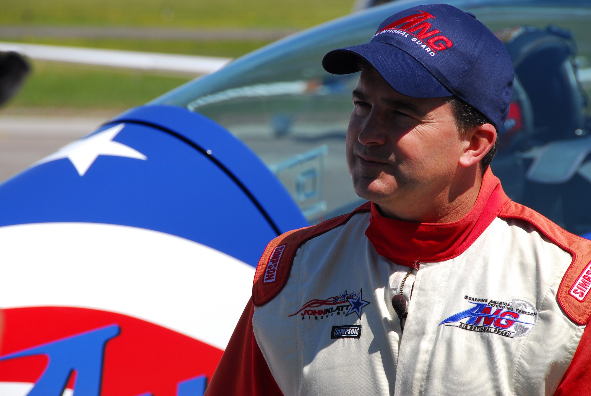 U.S. Air Force Major John Klatt, 148th Fighter Wing Pilot, talks with a local reporter after a flight in the ANG aerobatic demonstration plane over Duluth, Minn. on 14 July, 2008.  John Klatt and the Guarding America, Defending Freedom Aerobatic team will be performing at the Duluth Air Show to promote the Air National Guard 19-20 July, 2008 . (U.S. Air Force photo by Tech. Sgt. Jason W. Rolfe)  (Released) 