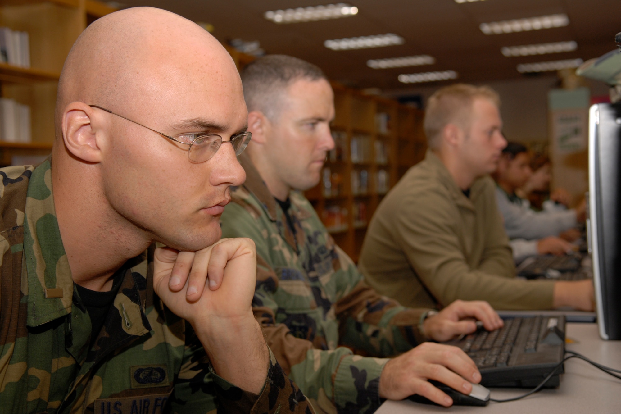 VANDENBERG AIR FORCE BASE, Calif. --  Airmen utilize the computers provided by the base library here. The library is equipped with more than 30 computers, which are available to all eligible library users for general use and commercial email. (U.S. Air Force photo/Airman 1st Class Andrew Satran)
