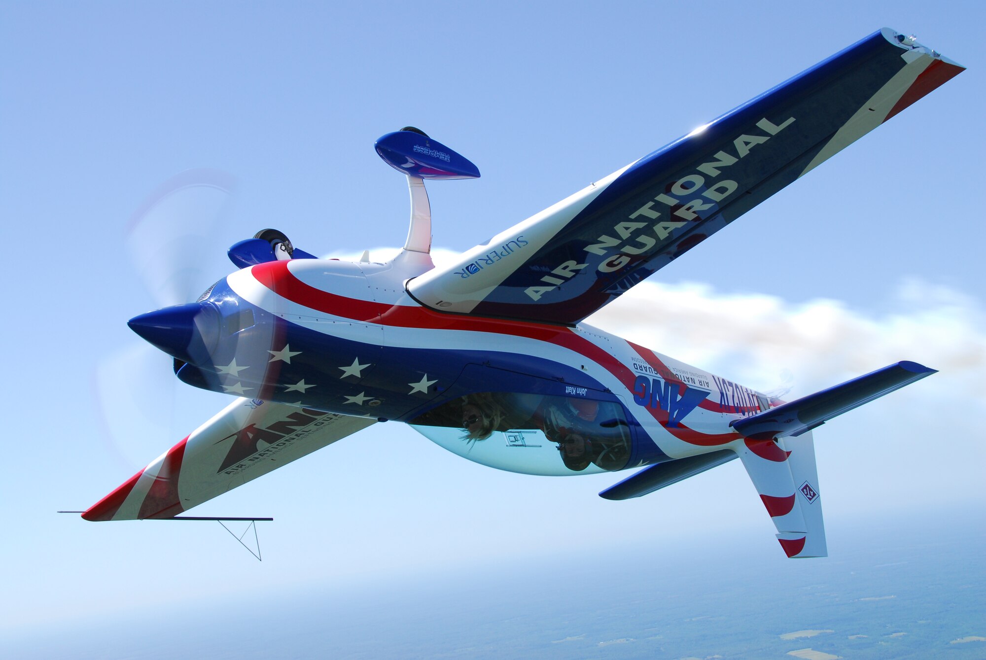 U.S. Air Force Major John Klatt, 148th Fighter Wing Pilot, flies a local reporter in the ANG aerobatic demonstration plane over Duluth, Minn. on 14 July, 2008.  John Klatt and the Guarding America, Defending Freedom Aerobatic team will be performing at the Duluth Air Show to promote the Air National Guard 19-20 July, 2008 . (U.S. Air Force photo by Tech. Sgt. Jason W. Rolfe)  (Released) 