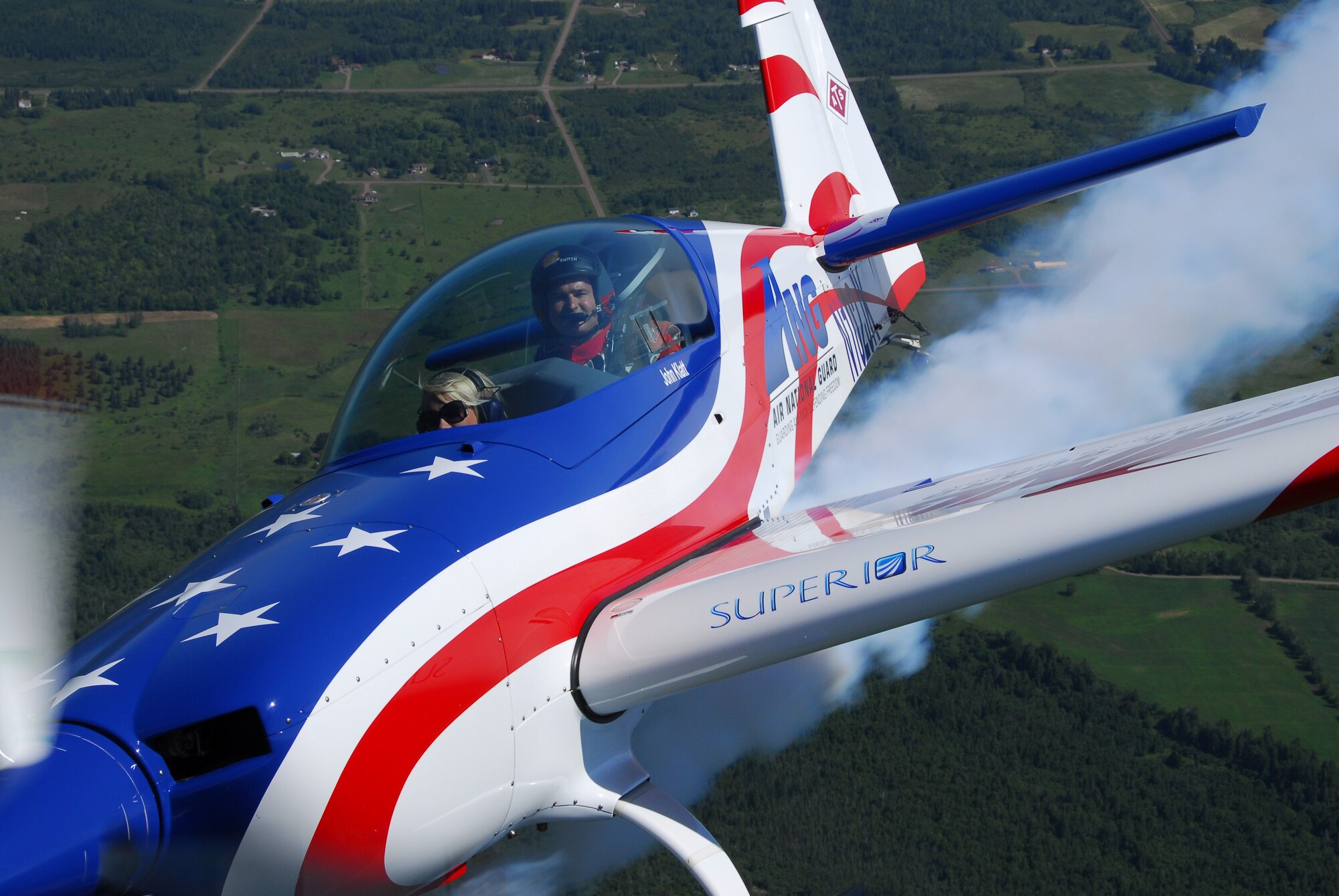 U.S. Air Force Major John Klatt, 148th Fighter Wing Pilot, flies a local reporter in the ANG aerobatic demonstration plane over Duluth, Minn. on 14 July, 2008.  John Klatt and the Guarding America, Defending Freedom Aerobatic team will be performing at the Duluth Air Show to promote the Air National Guard 19-20 July, 2008 . (U.S. Air Force photo by Tech. Sgt. Jason W. Rolfe)  (Released) 