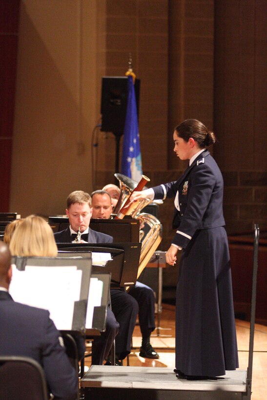 Captain Moore Urrutia conducts the Band of the West Concert Band.