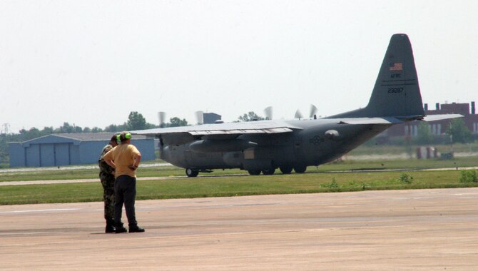 NIAGARA FALLS AIR RESERVE STATION, N.Y. - The last of Niagara's C-130 H3 model aircraft departs Niagara Falls for the final time July 11.  As part of  the 2005 Base Realignment and Closure (BRAC) commission, the 914th Airlift Wing exchanged its eight C-130H3 aircraft for 12 C-130 H2 models.  In addition, the 107th Airlift Wing of the New York Air National Guard has formed an association with the Air Force Reserve at Niagara.  In an associate base, units will share people, resources  and equipment to accomplish their flying mission.  (U.S. Air Force photo / Mr. Michael Harvey)
