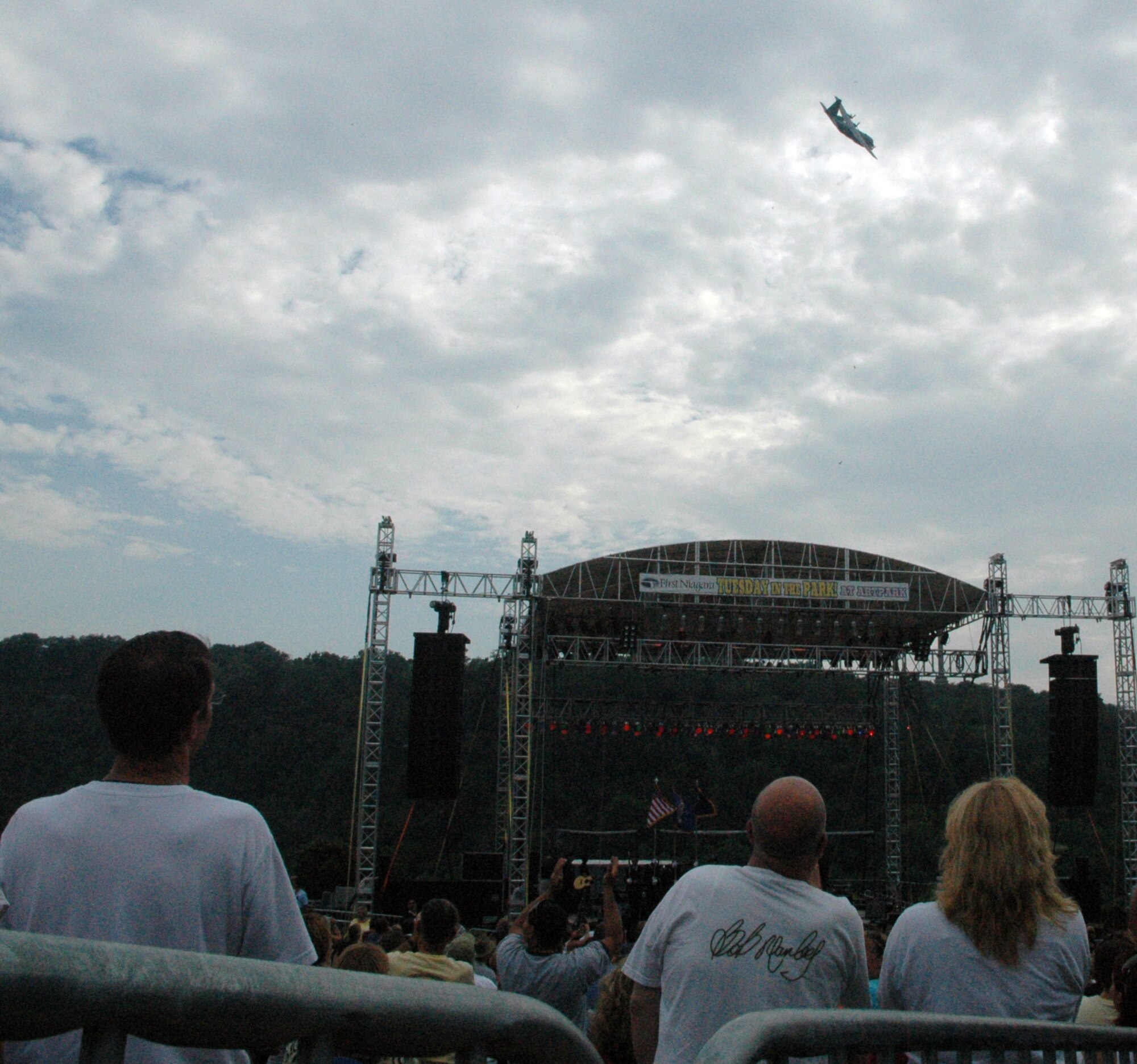 NIAGARA FALLS AIR RESERVE STATION, N.Y. - Air Force Reserve personnel from the 914th Airlift Wing were given the opportunity to raise community awareness of the Reserve program and to express their appreciation to the thousands of local supporters of the military via a free concert venue at Artpark in Lewiston, NY.  The rock band Kansas was the featured act and before the concert 914th Airlift Wing commander Col. Reinhard Schmidt spoke to a crowd of more than 15,000 to voice his appreciation for the outstanding support given to the air base by the Western New York community.  Staff Sgt. Joel Laureno, 914 AW line recruiter, sang the National Anthem while the Niagara Falls Base Honor Guard presented the colors.  A perfectly timed two ship C-130 formation flyover culminated the opening ceremony.  (U.S. Air Force photo / Tech. Sgt. Kevin Nichols)