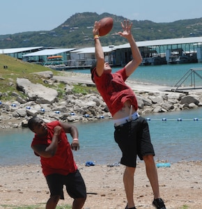 Airmen spent the day at the first-ever Airmens' Summer Bash at Canyon Lake Recreation Park July 11. The event featured a cookout, sporting events, a disc jockey and interactions with base leadership. (U.S. Air Force photos by Rich McFadden)