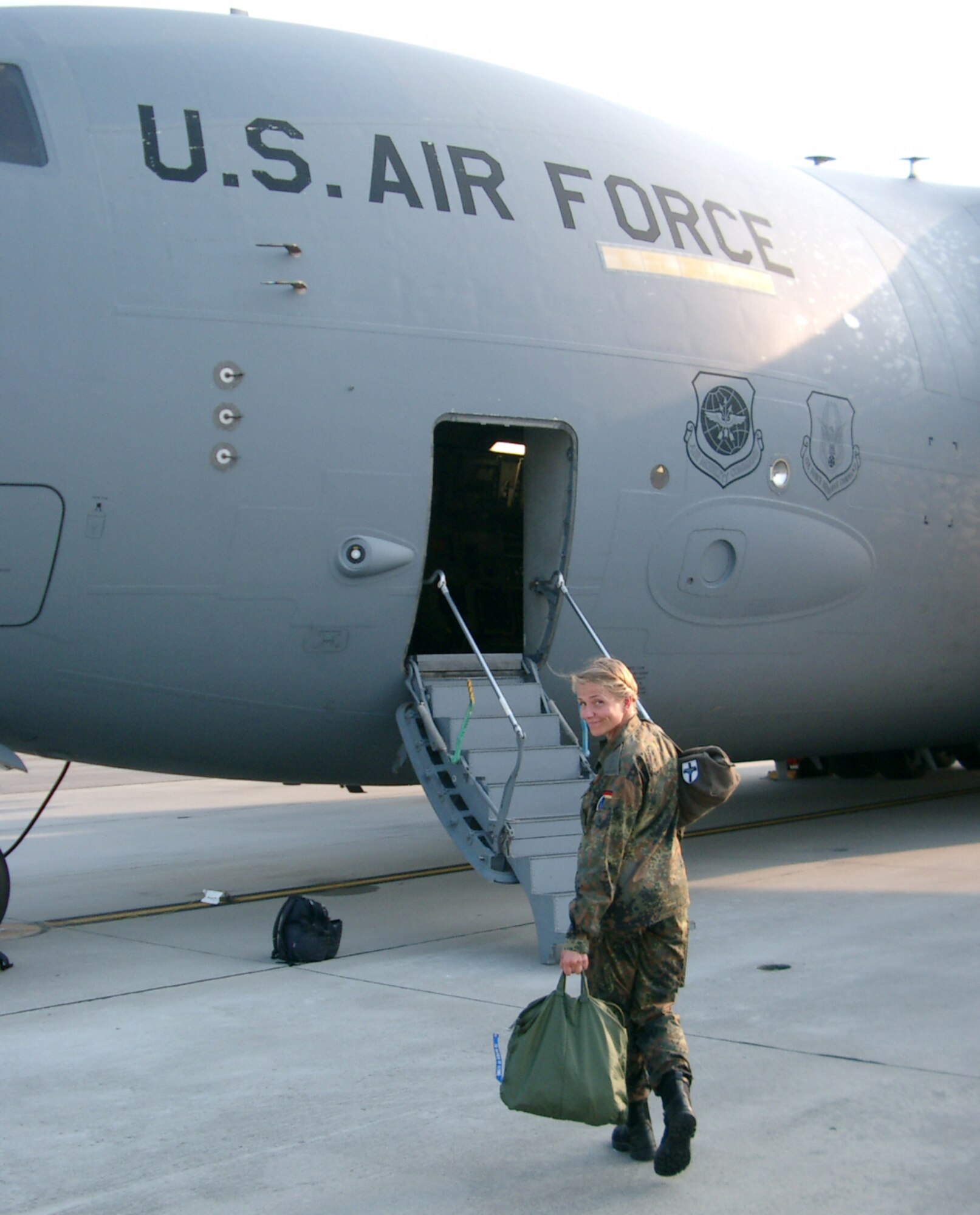 Capt. Frauke Keller, an exchange officer with the German Air Force Reserve, prepares to board a C-17 Globemaster III for an orientation flight.  (U.S. Air Force photo / Capt. Wayne Capps)