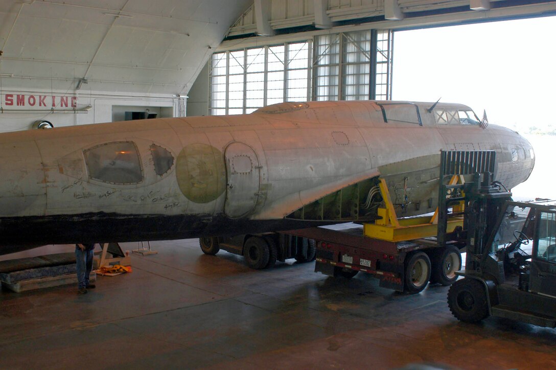 Restoration crews work together to unload the fuselage of the B-17D The Swoose that recently arrived at the National Museum of the U.S. Air Force near Dayton, Ohio, from the National Air and Space Museum in Washington D.C. (U.S. Air Force photo)                              