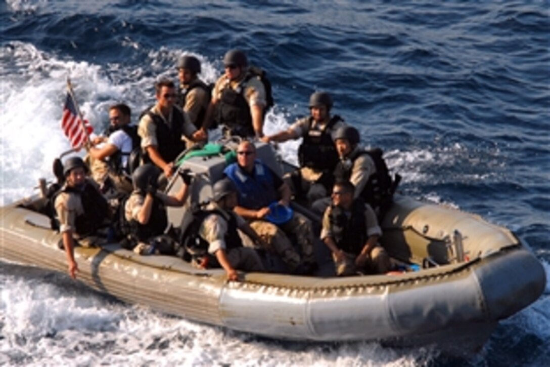 The visit, board, search and seizure team conducts maritime interdiction operations during an Iwo Jima Expeditionary Strike Group exercise in the Atlantic Ocean, July 12, 2008. The team is assigned to the amphibious dock landing ship USS Carter Hall.