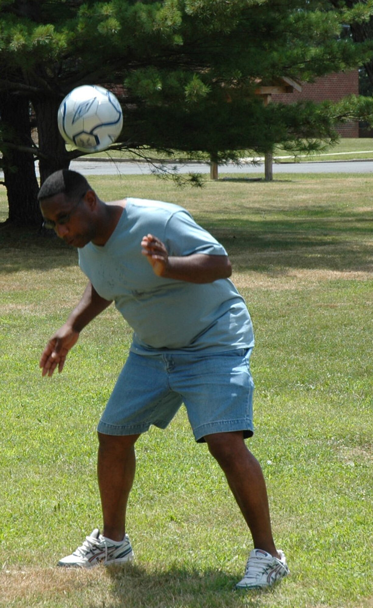 One U.S. Air Force Expeditionary Center member gets in some practice with a soccer ball during the USAF EC annual picnic July 11, 2008, on Fort Dix, N.J.  (U.S. Air Force Photo/Staff Sgt. Paul R. Evans)