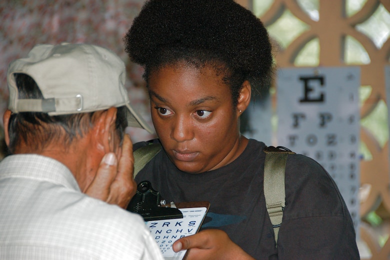 Staff Sgt. Craikista D. Foster administers an eye-chart test to a local resident at a school in Cabuya, Panama, during a Medical Readiness Training Exercise-Panama, July 15. Sergeant Foster is a technician from the 42nd Medical Group at Maxwell Air Force Base, Ala. The MEDRETE is a two-week long U.S. Southern Command sponsored exercise designed to hone the skills of medical personnel, while providing free health care in remote locations through partnership with host nation doctors. Approximately 990 patients were seen by the medical staff at the Cabuya location July 14-15. (U.S. Air Force photo/Capt. Ben Sakrisson)