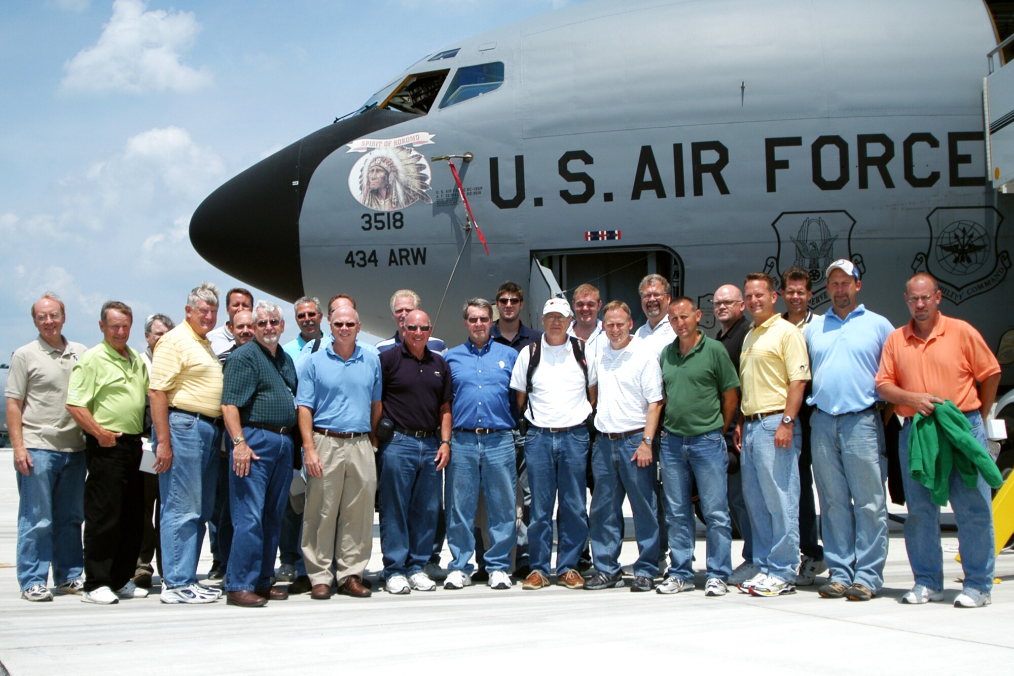 GRISSOM AIR RESERVE BASE, Ind., -- Civic leaders from the Warsaw, Ind., region pose in front of a KC-135R Stratotanker prior to participating in a special orientation flight.  During the aerial refueling mission, the civic leaders witnessed operations between the KC-135R and a C-17 from Charleston Air Force Base, S.C.  Civic leader flights are a vital part of Grissom's community outreach program.  (U.S. Air Force photo/Capt. Kelly Howard)
