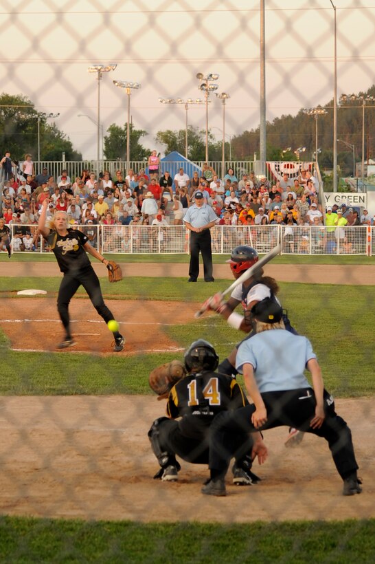 Tara Oltman, Black Hills Gold softball team pitcher, hurls the ball to Andrea Duran, U.S.A. Olympic Softball team infielder, at the Pete Lien Memorial Field, Rapid City, S.D., July 15. Oltman was relieved in the bottom of the seventh inning but was able to hold the Olympic team to only seven runs. (U.S. Air Force photo/Senior Airman Kasey Zickmund)