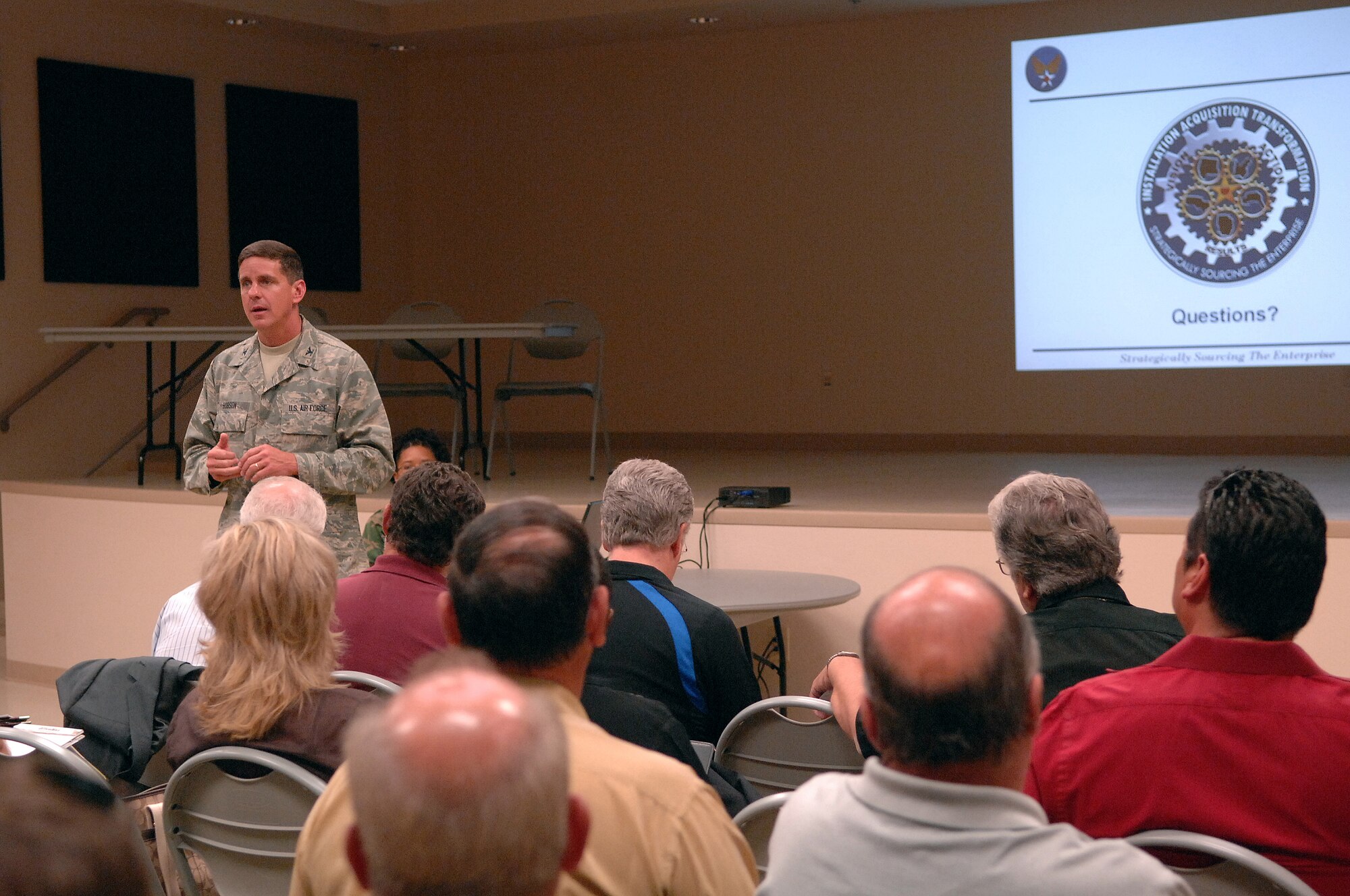 Col. Mark Hobson, Headquarters Air Force Materiel Command Directorate of Contracting Resource Management Division chief, talks to local business owners about how the upcoming Installation Acquisition Transformation will affect how they do business with Nellis Air Force Base during a town hall meeting at the Dr. William C. Pearson Community Center in Las Vegas, Nev., July 14, 2008. Colonel Hobson explained how the transformation would occur and then took questions from the audience regarding their concerns over the changes.  (U.S. Air Force photo / Senior Airman Kasabyan D. Musal)
