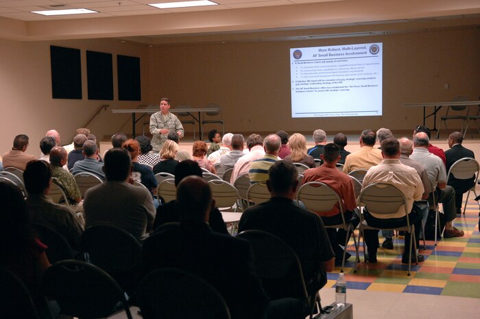 Col. Mark Hobson, Headquarters Air Force Materiel Command Directorate of Contracting Resource Management Division chief, talks to local business owners about how the upcoming Installation Acquisition Transformation will affect how they do business with Nellis Air Force Base during a town hall meeting at the Dr. William C. Pearson Community Center in Las Vegas, Nev., July 14, 2008. Colonel Hobson explained how the transformation would occur and then took questions from the audience regarding their concerns over the changes.  (U.S. Air Force photo / Senior Airman Kasabyan D. Musal)
