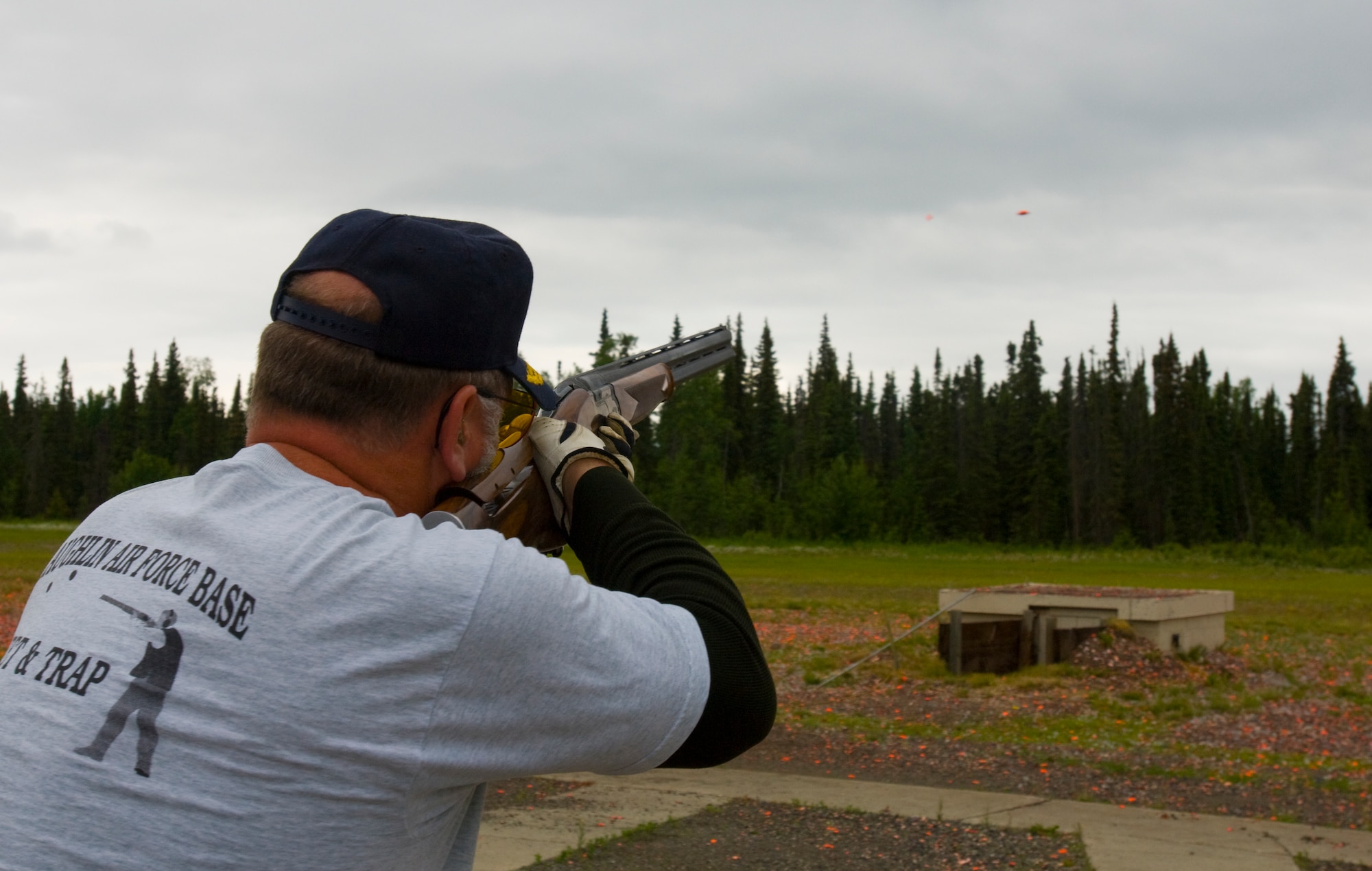ELMENDORF AIR FORCE BASE, Alaska -- Master Sgt. Kevin Weinand, 354th Medical Operations Squadron, takes aim at one of his 100 pigeons shot during the 410 Bore competition of Alaska Skeet State Championship at Fort Richardson July 13. This was Sergeant Weinand's third state shoot since he began shooting. Sergeant Weinand finished the competition shooting 377 out of 400 pigeons. He was also selected as honorable mention to the All-American Team and Zone 7 Military Team. (U.S. Air Force photo/Airman 1st Class David Carbajal)