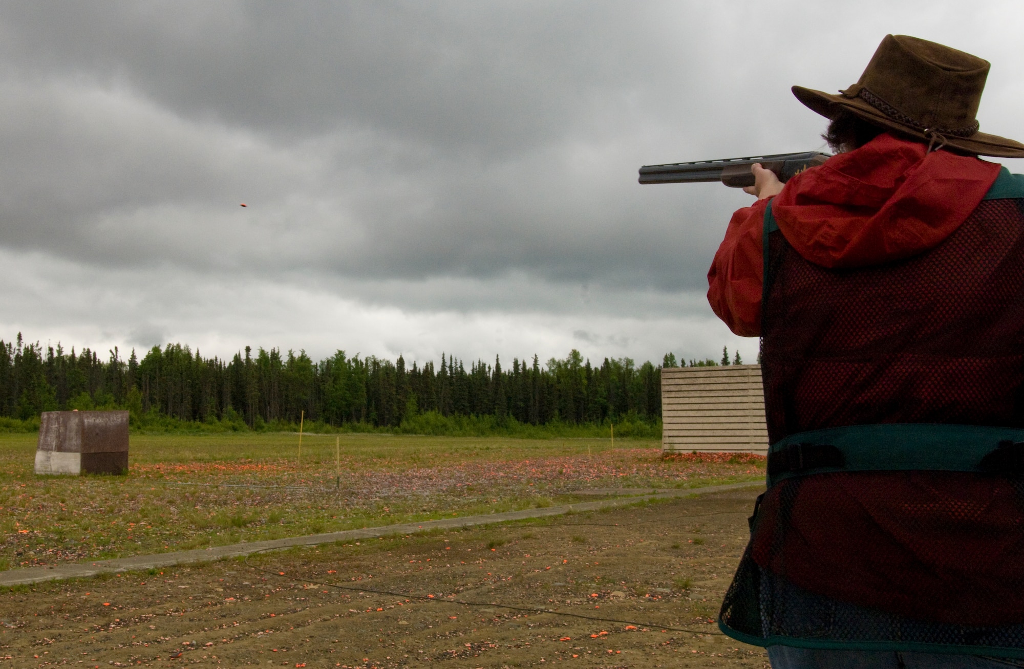 ELMENDORF AIR FORCE BASE, Alaska -- Senior Master Sgt. Mary Bousson, Alaskan Command, takes a shot at a clay pigeon during the Alaska Skeet State Championship July 13. This shoot was Sergeant Bousson's fifth in her four years of shooting. (U.S. Air Force photo/Airman 1st Class David Carbajal)