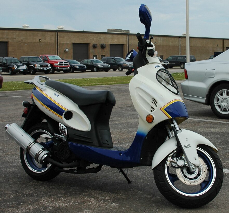 Staff Sgt. Evan Castillo, 28th Maintenance Group information management journeyman, drives this moped which saves him more than $100 per month in gas. 
(U.S. Air Force photo/Senior Airman Kimberly Moore Limrick)