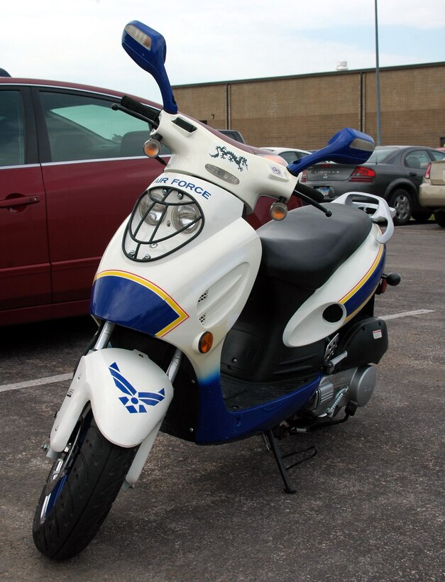 Staff Sgt. Evan Castillo, 28th Maintenance Group information management journeyman, drives this moped which saves him more than $100 per month in gas. 
(U.S. Air Force photo/Senior Airman Kimberly Moore Limrick)