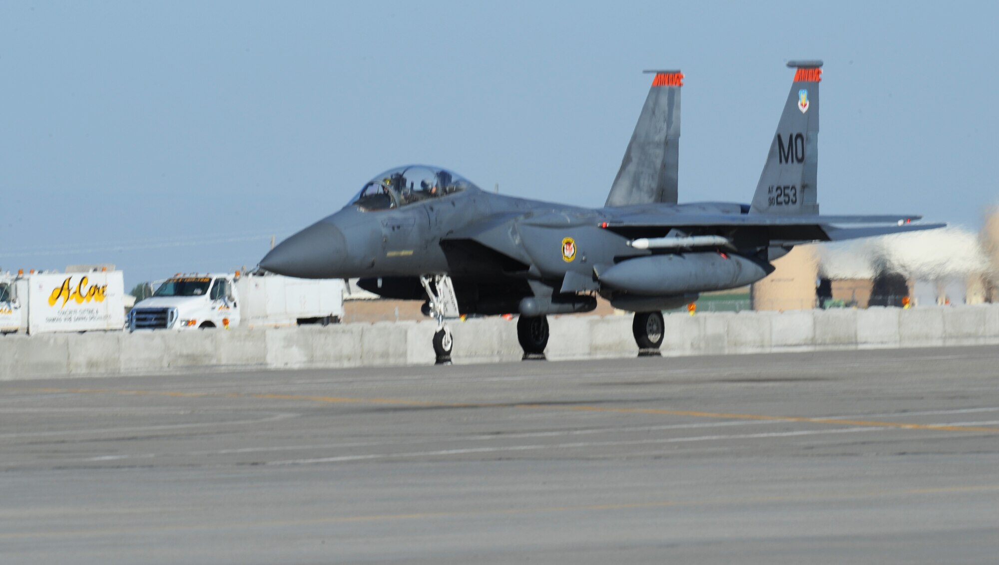 MOUNTAIN HOME AIR FORCE BASE, Idaho – An F-15E Strike Eagle from the 391st Fighter Squadron prepares to depart the base to support an exercise at Nellis AFB, Nevada, July 10.  More than 200 Airmen departed here July 10 to take part in a two-week, joint-mission and joint-force exercise, known as Green Flag.  (U.S. Air Force photo/ Airman 1st Class Stephany Miller)