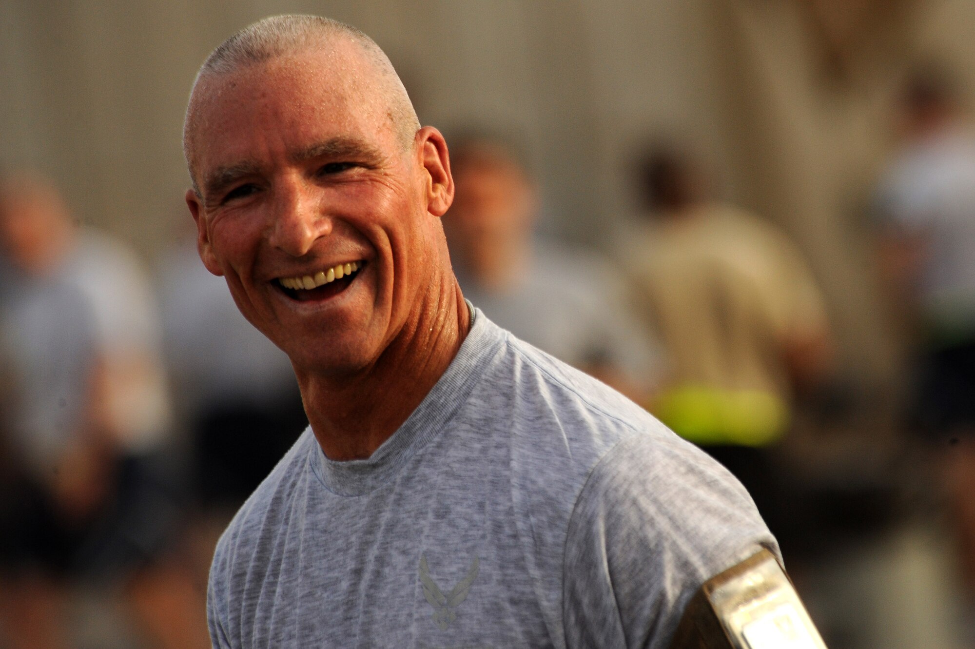 Master Sgt. Jeffrey Conant, one of the organizers of the Baghdad Boilermaker, smiles after finishing the 15-kilometer race. More than 240 deployed servicemembers from around the Victory Base complex participated in the first Baghdad Boilermaker race June 13 at Sather Air Base, Iraq. Sergeant Conant is with the 447th Expeditioanry Civil Engineer Squadron and (U.S. Air Force photo/Tech. Sgt. Jeffrey Allen) 
