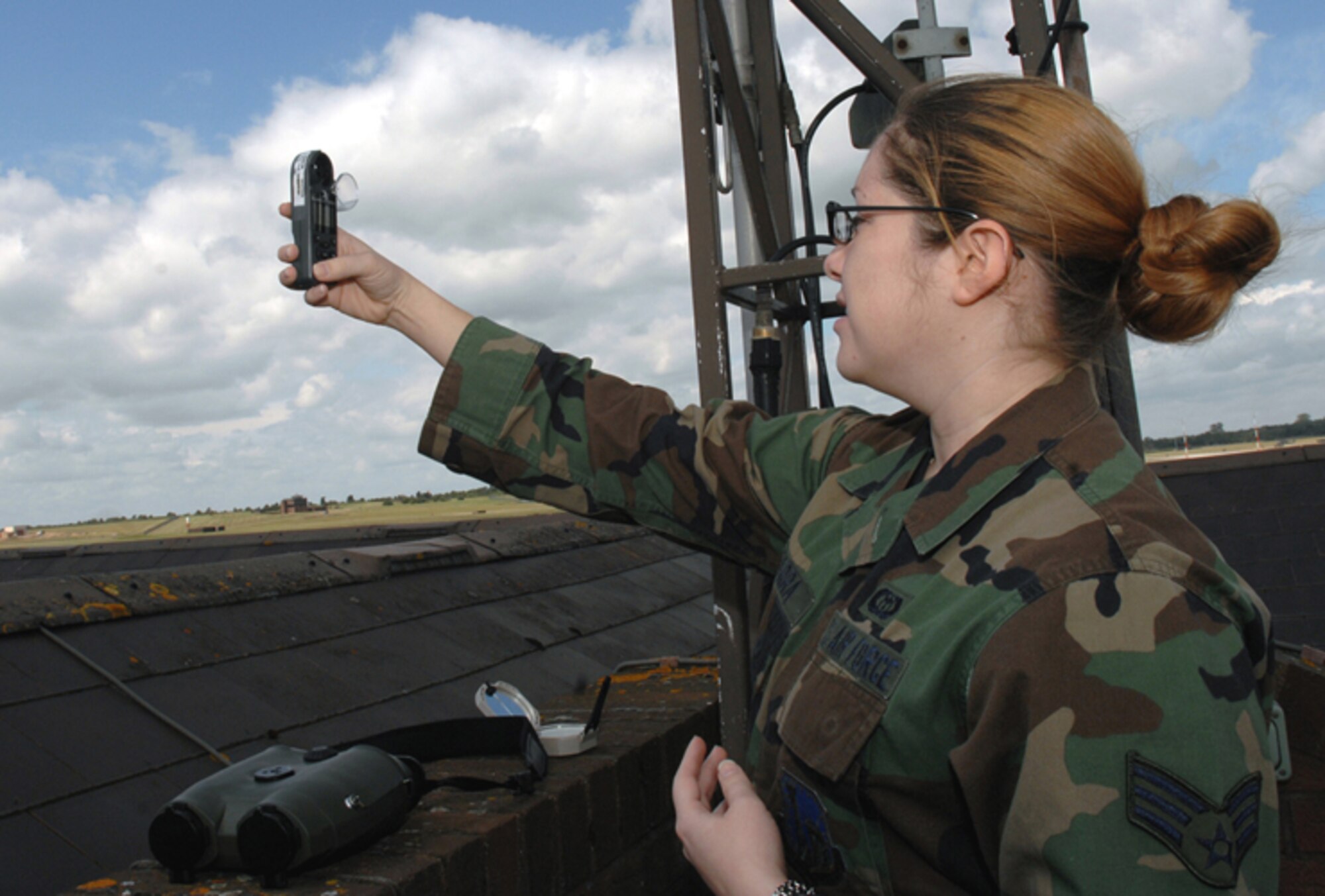 Senior Airman Cecilia M. Ybarra, 48th Operations Support Squadron weather forecaster, uses a kestrel to check speed, direction and temperature of the wind.  The weather flight monitors weather conditions to make sure aircraft have a safe environment to fly. (U.S. Air Force photo by Airman 1st Class Jessica Donnelly)