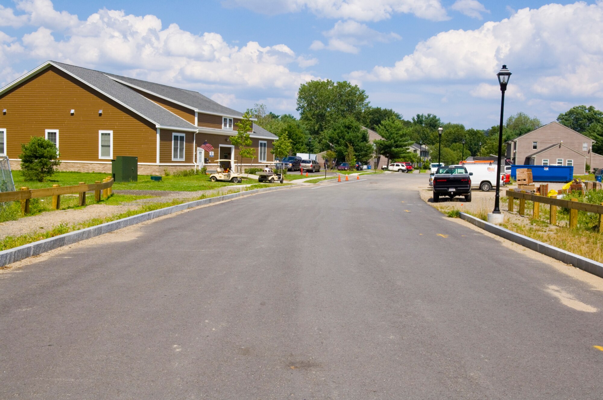 HANSCOM AFB, Mass. – The North Bridge Road, located in Hanscom Family Housing is now open to vehicle traffic. Residents are asked to proceed carefully through this area; new stop signs have been posted at both ends of the street and a speed limit of 10 MPH will be strictly enforced. Hanscom Family Housing reminds all residents especially children to utilize the sidewalks when walking on the North Bridge Road since it is no longer a pedestrian only thoroughfare.  (U.S. Air Force photo by Rick Berry)