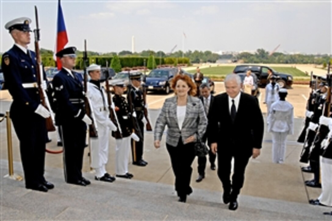 Defense Secretary Robert M. Gates, right, escorts the Czech Republic's Minister of Defense Vlasta Parkanova through an honor cordon at the Pentagon in Washington, D.C., July 16, 2008.  The two defense leaders will meet to discuss a broad range of security issues of mutual interest.